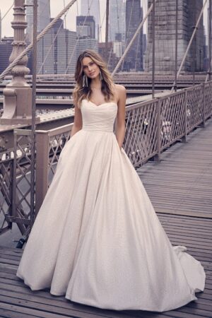front of Anniston wedding dress by Maggie Sottero. Sparkle ball gown strapless