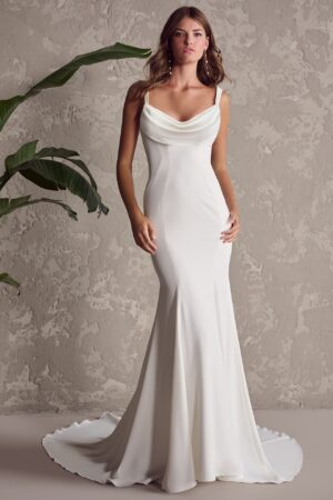 Napa Marie by Maggie Sottero. Loving the minimalist trend? This cowl neckline wedding dress proves "sexy and effortless" is all you need for an unforgettable celebration vibe.