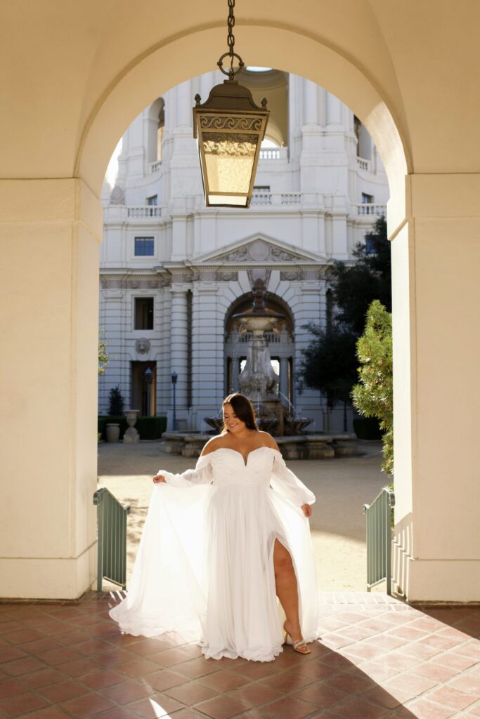 Picture of D3636 by Essense of Australia wedding dress that  has waist defining diagonal ruching