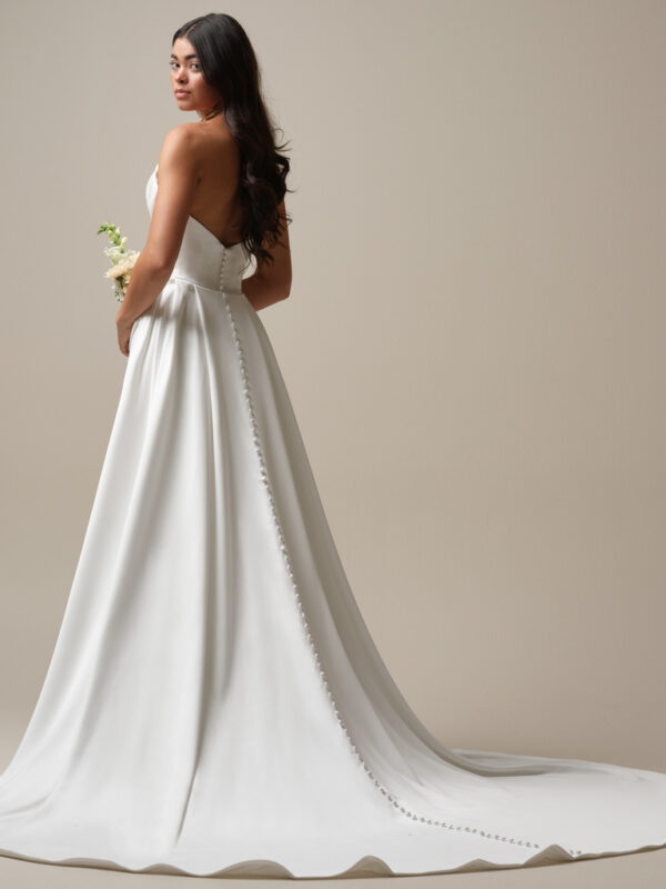 picture of back of camille by maggie sottero with overskirt