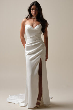 Picture of Camille by Maggie Sottero a simple satin sheath wedding dress with a slit