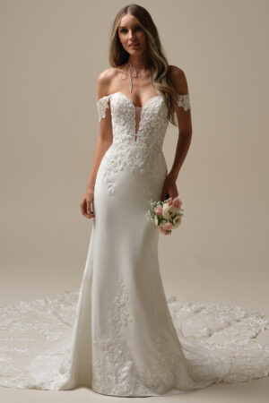 Picture of Yara by Maggie Sottero a fitted wedding dress with lace train